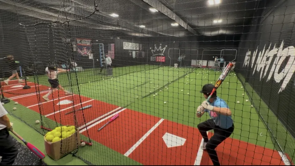 Hitting lesson in the batting cages at Better Baseball Training Rocklin